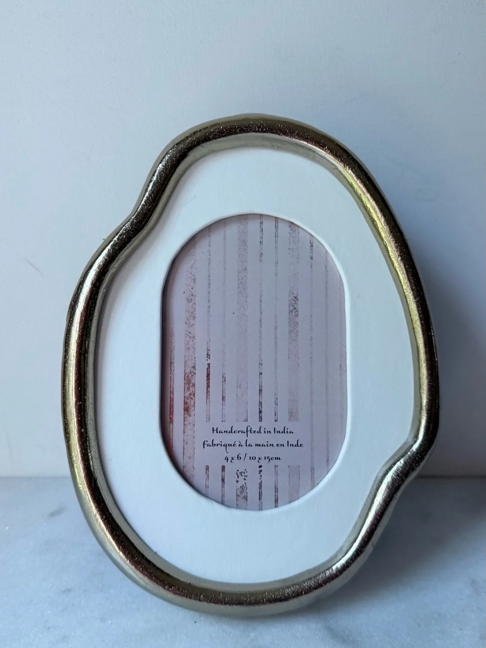 Organic gold metal irregular oval shape picture frame